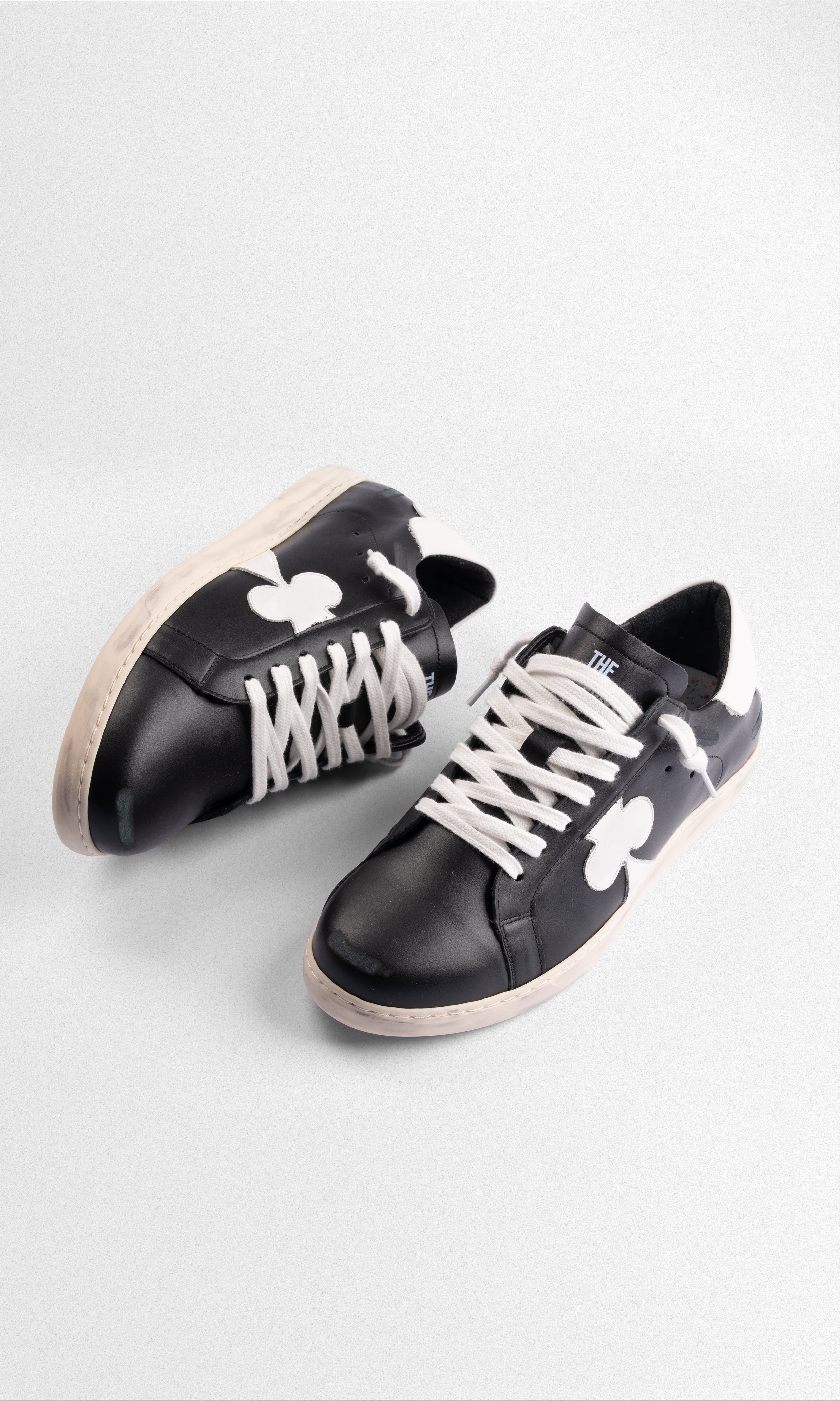 Sneaker de Cuero Geneva — Black & White